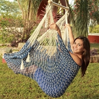 Cotton hammock chair in maritime design. 